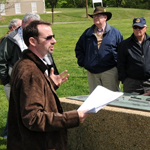 Garry Adelman speaking with a group at Fort Stevens